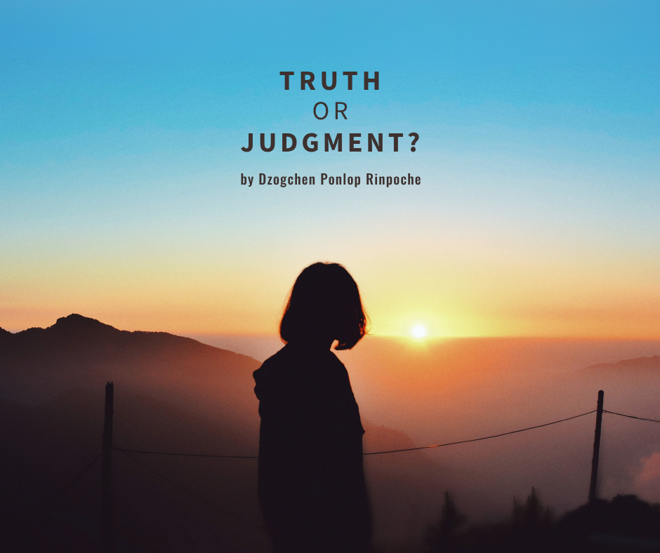 Person with shoulder-lenth hair and wearing a hoodie stands in silhouette behind a bare wire fence, turning to look at an orange and gold mountain sunset under an aqua blue sky.