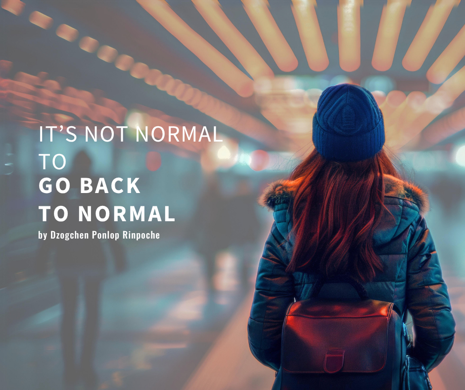 Figure with long red hair, in sharp focus, is wearing a backpack, joining people, shown out of focus, walking down a lighted transport tunnel.